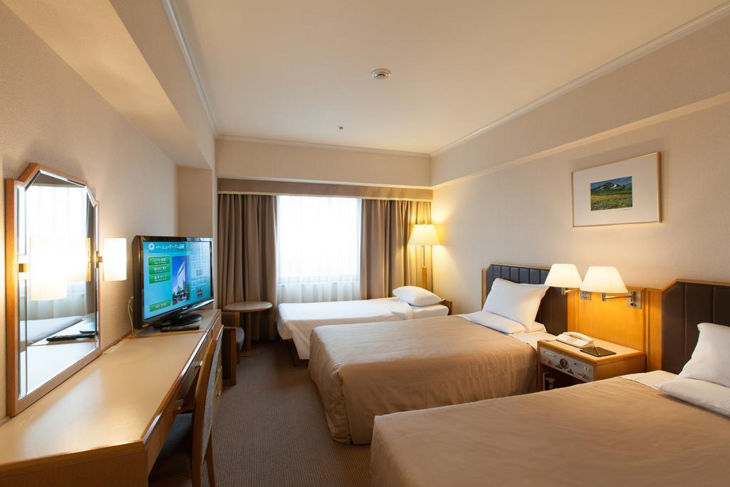 Hotel New Otani Takaoka Pokoj fotografie